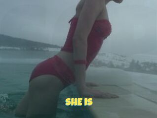 SHE_IS